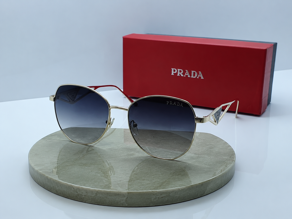 PRADA Cat-Eye Metal Sunglasses – Gold Wire Frame with Gradient Grey Lenses