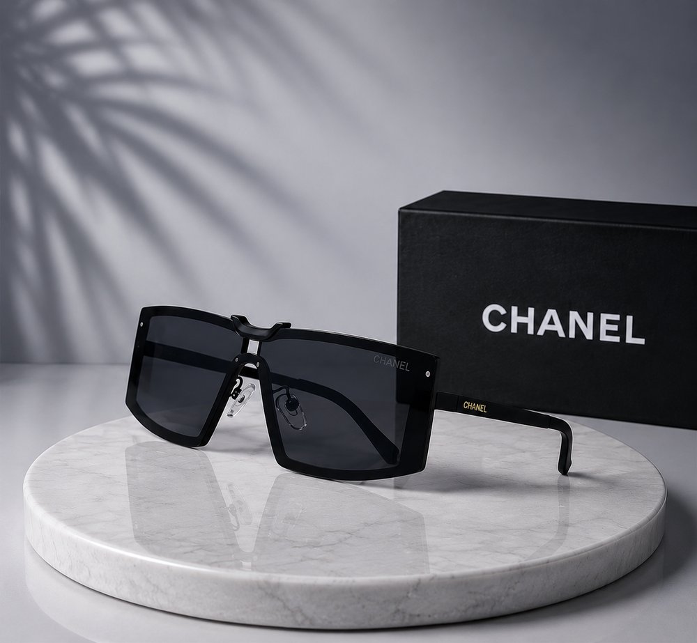 CHANEL Black Shield Sunglasses – Oversized Flat-Top Frame with Gold Logo Temples